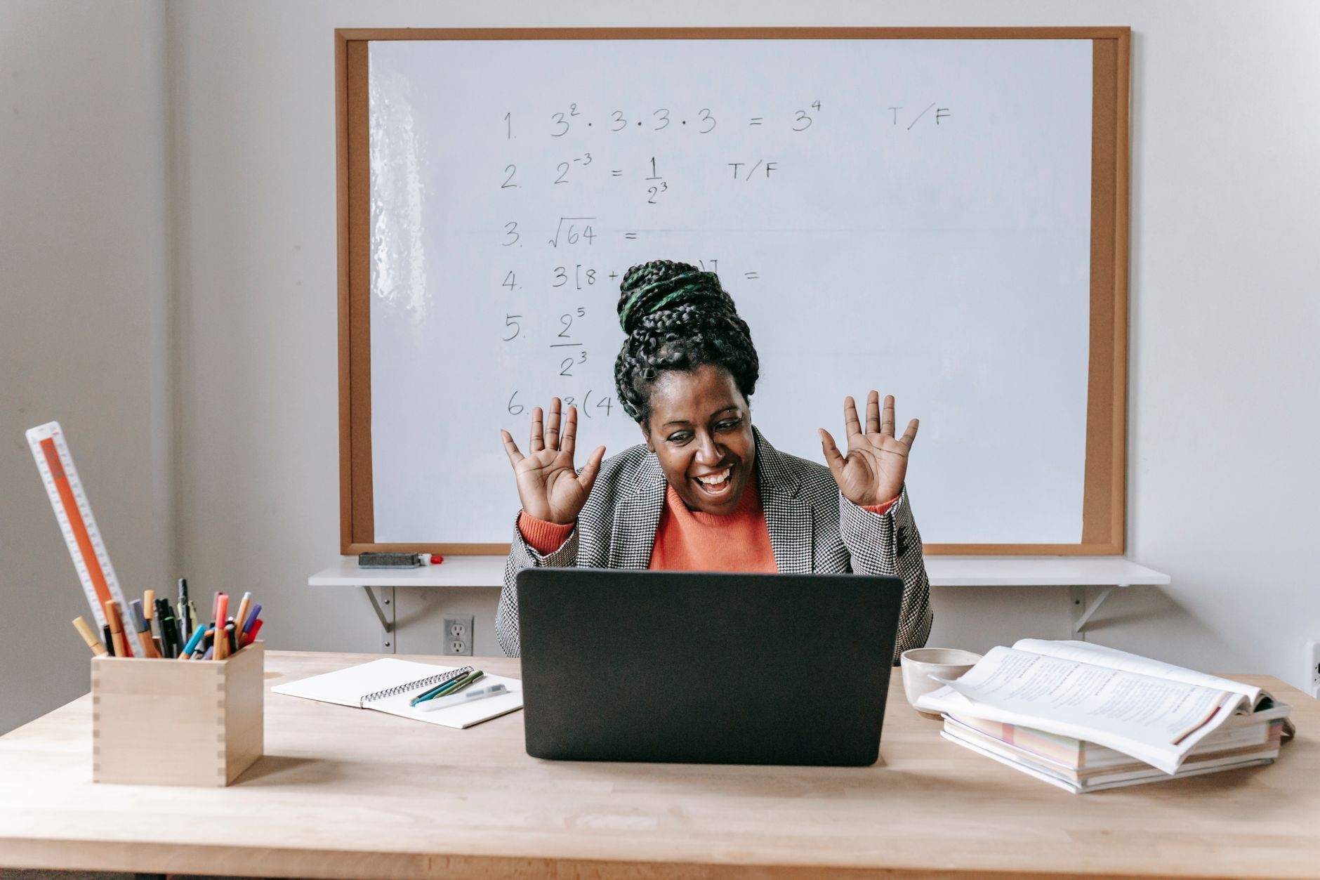A teacher giving an online lesson with a headset