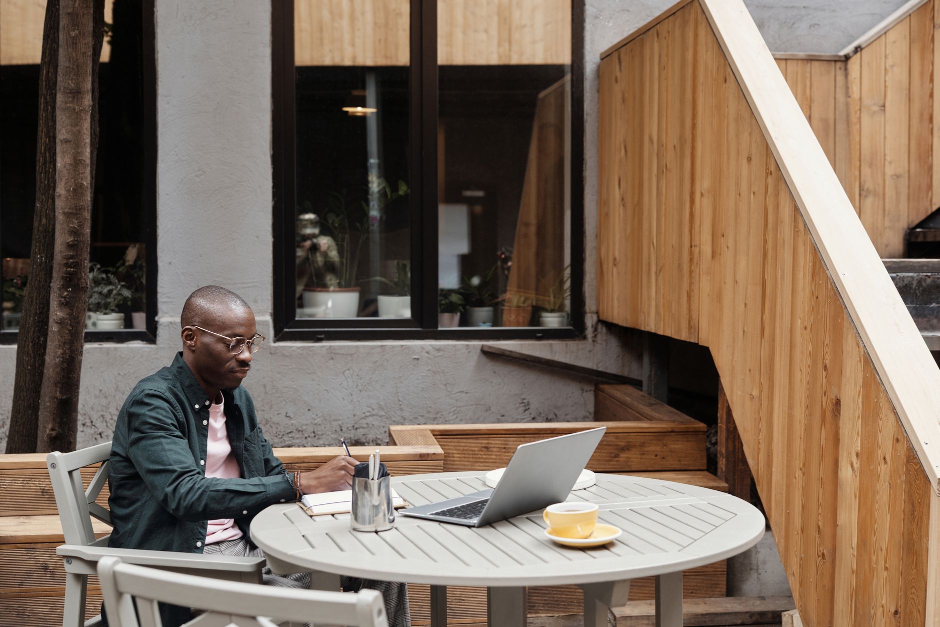 A freelance writer working at a cafe