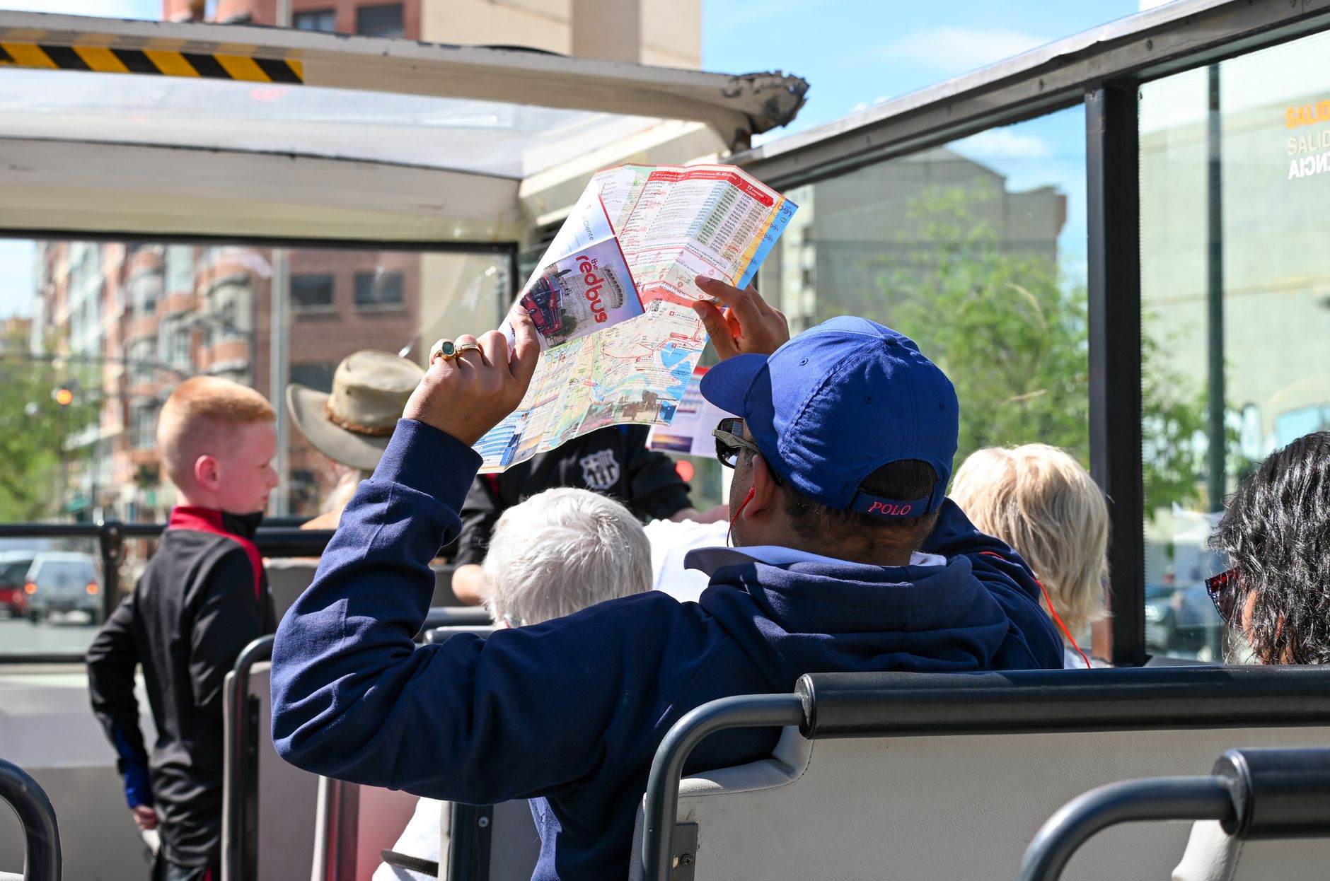 A tour guide leading a group through a city